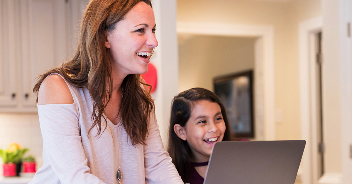 Capital One associate works from home with her daughter and talks about the benefits she receives from working at Capital One
